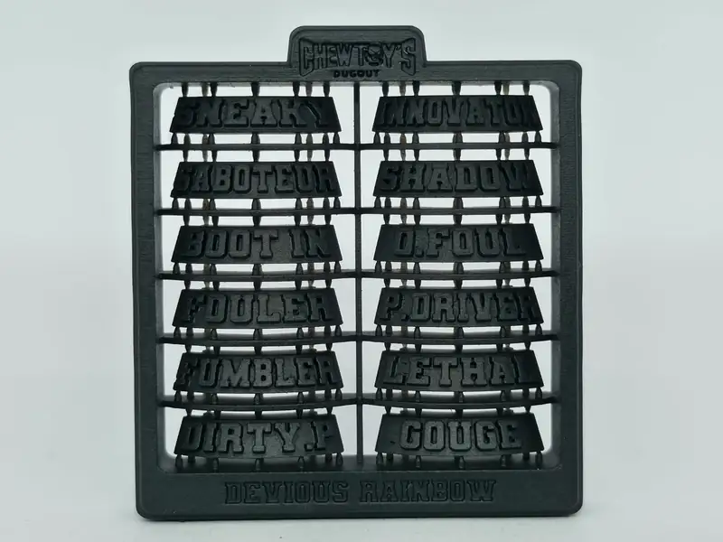 A printed sprue of twelve snap-in skill tags